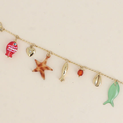 Bracelet - pearly and resin fish, cowrie shell, heart, pearl