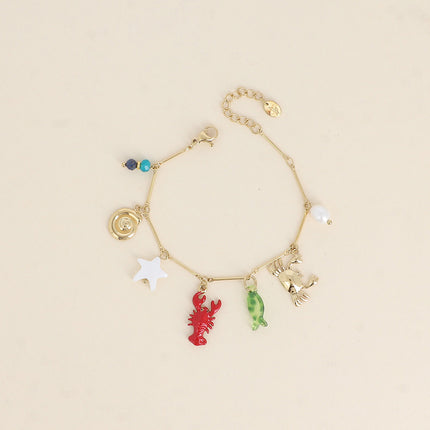 Bracelet Silena - crabe, homard en émail, étoile de mer nacrée, coquillage escargot, poisson en résine, perle d'eau douce et pierres naturelles