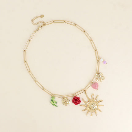 Collier - soleil, scarabée, rose et oiseau en résine, trèfle, coeur