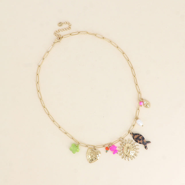 Necklace - hammered heart, sun, flower and fish in resin, natural stones
