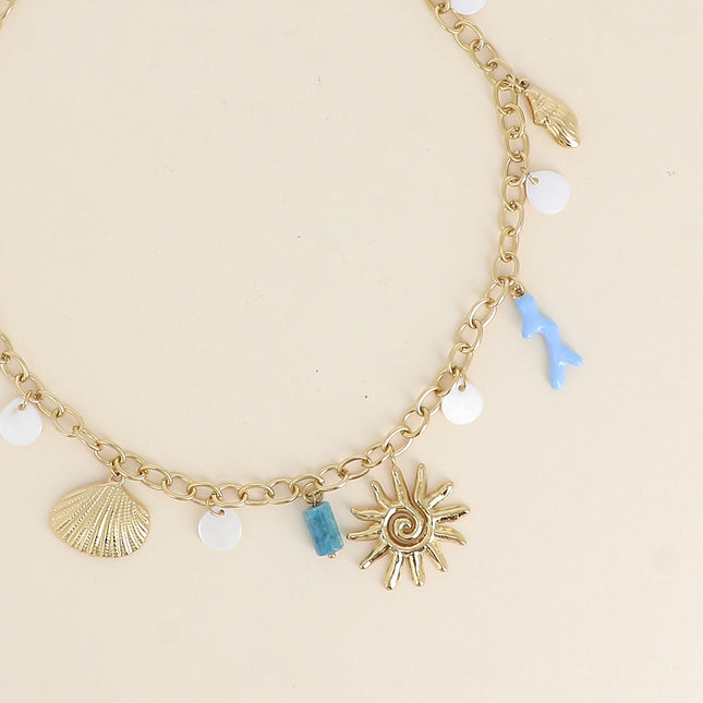 Maelia Necklace - sunburst, mother-of-pearl beads, flat seashell, enameled coral branch and natural stone