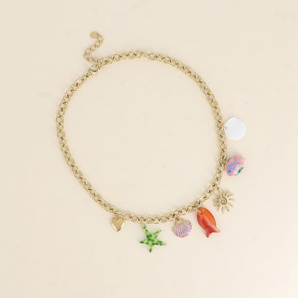 Collier - coquillages, poisson, étoile de mer et crabe