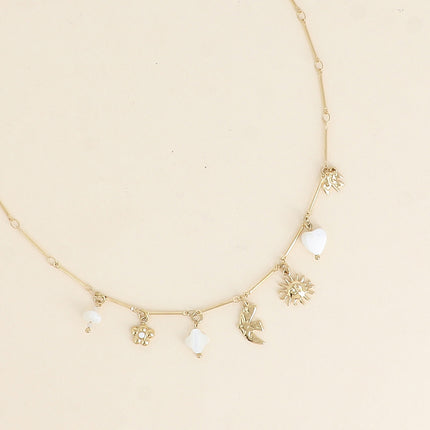 Collier Meliora - soleil, oiseau, trèfle et coeur nacrés, fleur