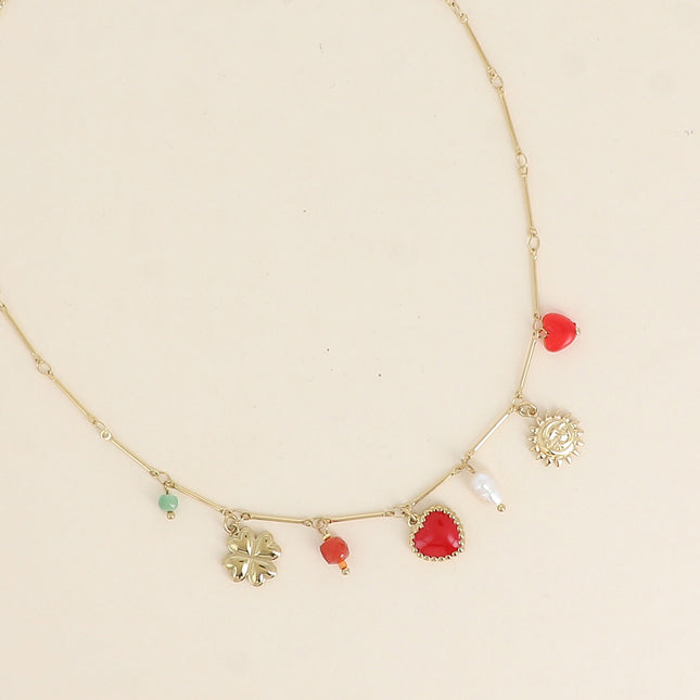 Collier - éclipse, coeur en émail, trèfle, perles et perle d'eau douce