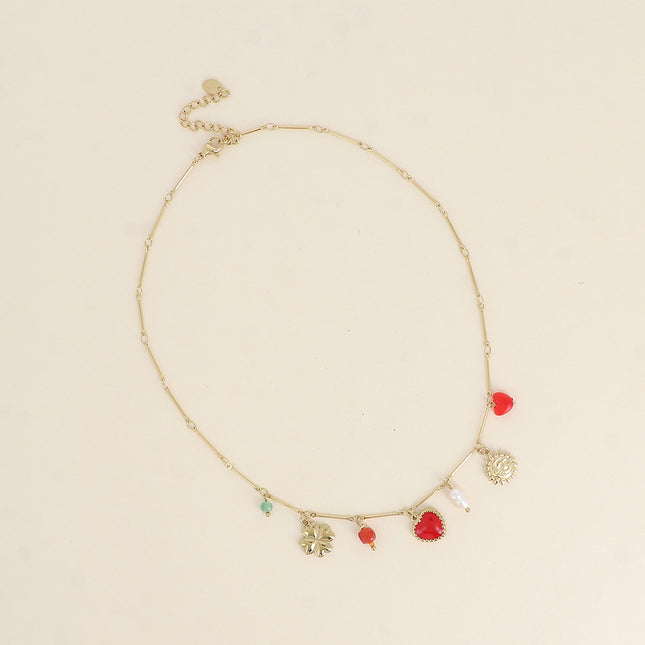 Collier - éclipse, coeur en émail, trèfle, perles et perle d'eau douce