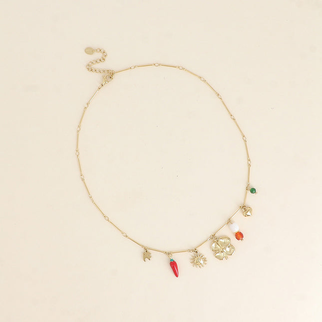 Collier - soleil, piment en émail, trèfle, perles et coeur
