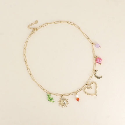 Collier - soleil, coeur, lune, perles et trèfle