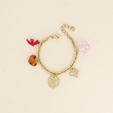 Bracelet Kalyra - oiseau et coeur en résine, coeur martelé, trèfle, perle fleur