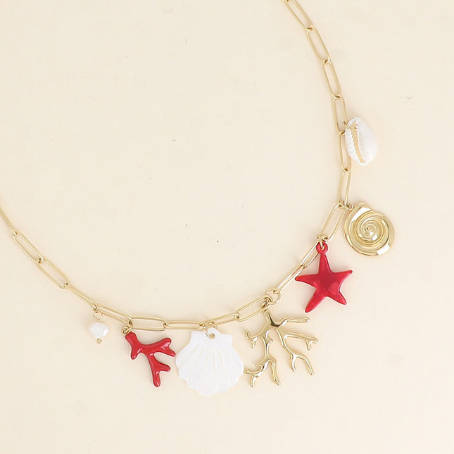 Collier - pièce en forme de corail, coquillage nacré, perle d'eau douce et étoile de mer en résine colorée