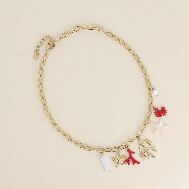 Collier - pièce en forme de corail, morceau nacré, pierres naturelles et cauri naturel
