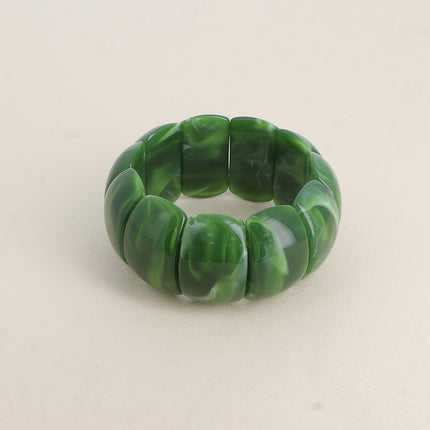 Bracelet élastique - pièces en résine colorée 32mm