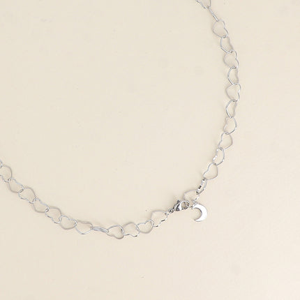 Collier - maillons coeurs et pendentif lune