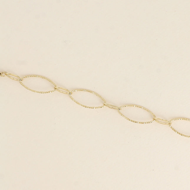 Bracelet - alternating oval, serrated and textured links