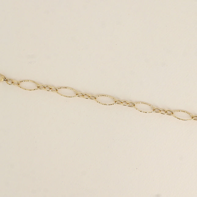 Bracelet - alternating oval, serrated and textured links