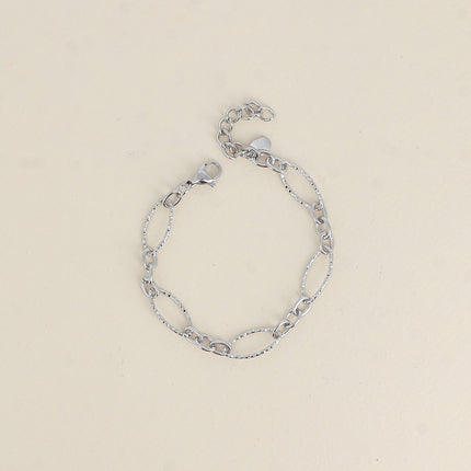 Bracelet - maillons alternés ovales dentelés et texturés