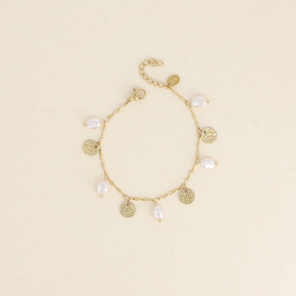 Bracelet - pampilles martelées et perles de résine blanche