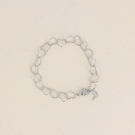 Bracelet - maillons coeurs et pendentif lune