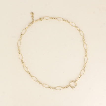 Collier - fermoir bouée, maillons alternés ovales dentelés, 3 petits maillons ovales