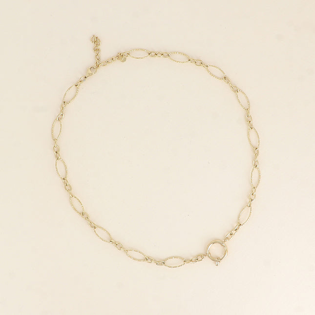 Collier - fermoir bouée, maillons alternés ovales dentelés, 3 petits maillons ovales