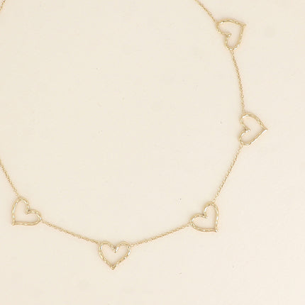 Necklace - openwork heart pendants