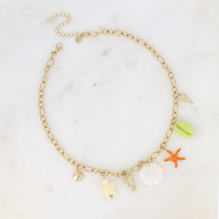 Collier - fleur nacrée, breloques marins (étoile de mer, tortue et cauri émaillés, coquillages)
