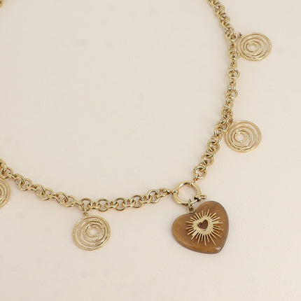 Collier Norah - breloques tourbillons, fermoir bouée avec coeur en résine