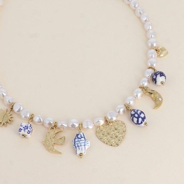 Collier sur fil - coeurs, soleil, oiseau, lune, perles en céramique émaillée