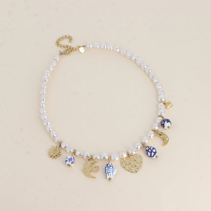 Collier sur fil - coeurs, soleil, oiseau, lune, perles en céramique émaillée