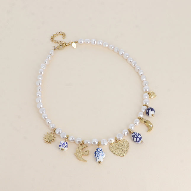 Collier sur fil - coeurs, soleil, oiseau, lune, perles en céramique émaillée