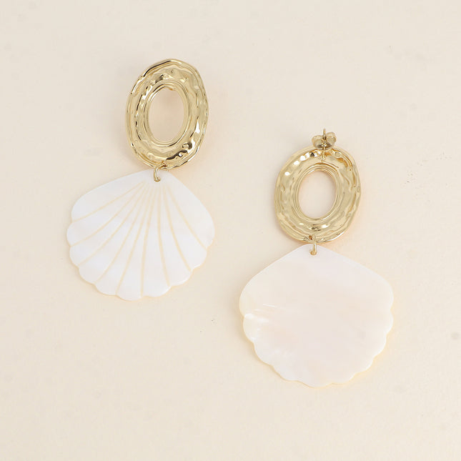 Dangle earrings - textured and openwork oval piece, and a mother-of-pearl shell
