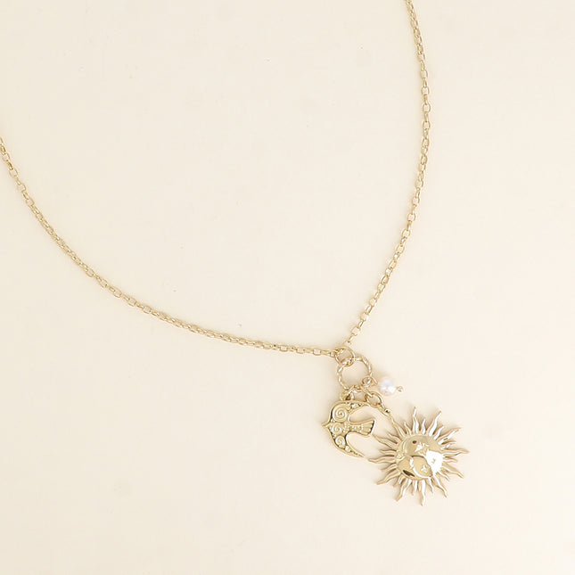 Collier - éclipse, oiseau totem, perle de résine