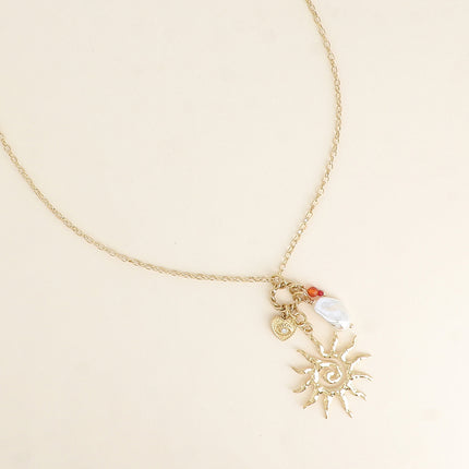 Collier - soleil, perle de résine blanche, coeur et oeil