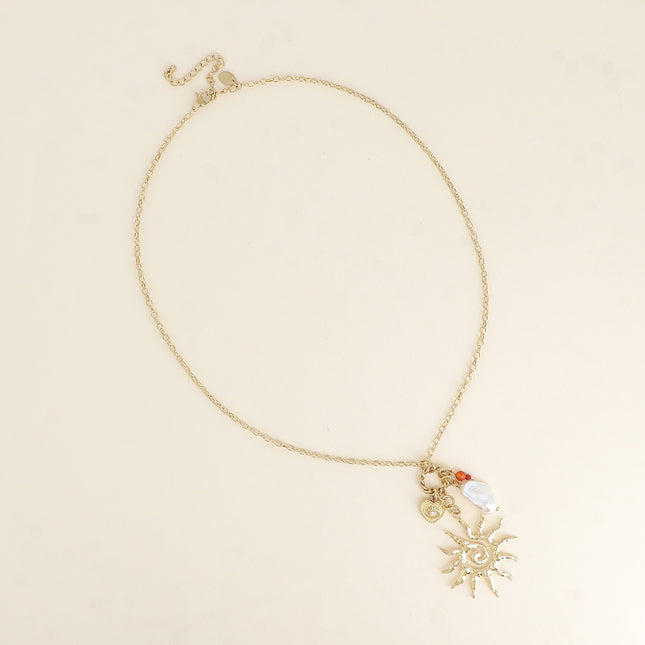 Collier - soleil, perle de résine blanche, coeur et oeil