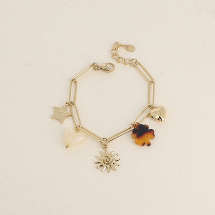 Bracelet Lionelle - étoile martelée, coeur et trèfle en résine, soleil tourbillonnant, coeur martelé