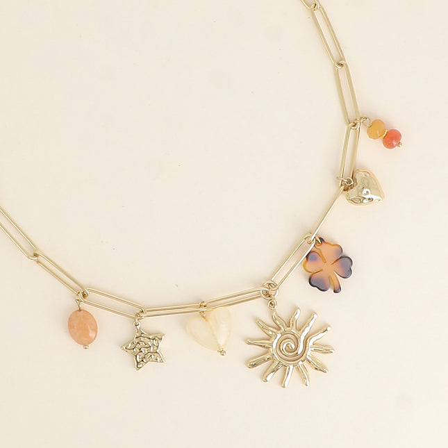 Lionelle Necklace - hammered star, resin heart and clover, swirling sun, hammered heart
