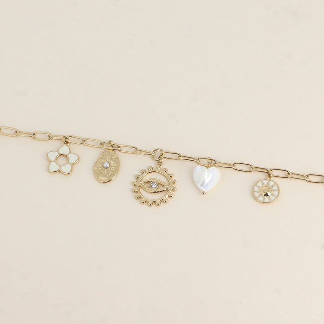 Bracelet - fleur en émail, soleils, coeur nacré, oeil