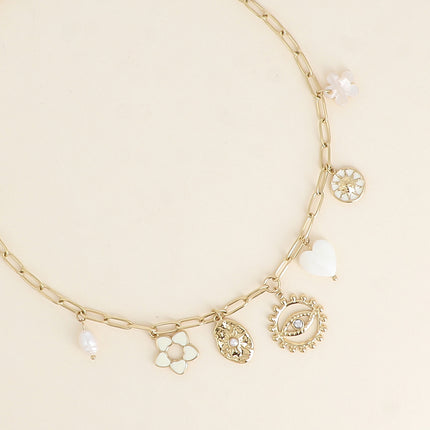 Collier - fleur en émail, soleils, coeur nacré, oeil, perle d'eau douce