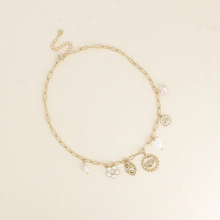 Collier - fleur en émail, soleils, coeur nacré, oeil, perle d'eau douce