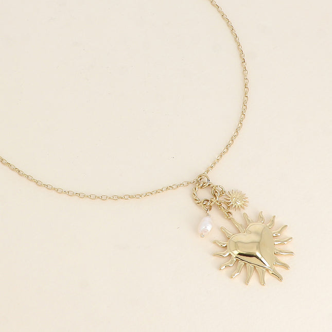 Collier - coeur, soleil et perle d'eau douce