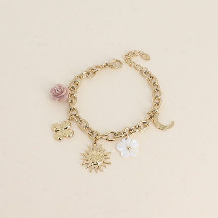Bracelet - fleur en résine, fleur nacrée, soleil, lune et trèfle