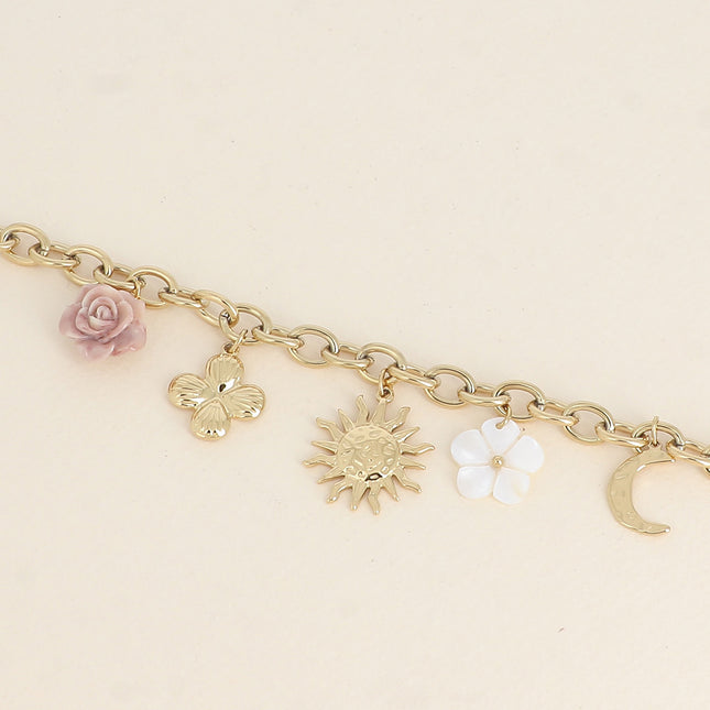 Bracelet - fleur en résine, fleur nacrée, soleil, lune et trèfle