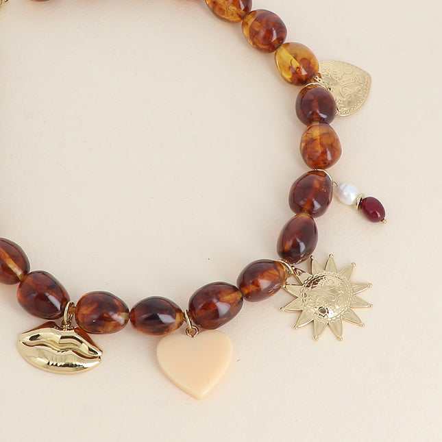 Café Crème Thread Necklace - mouth, sun, heart, resin heart, and natural stones