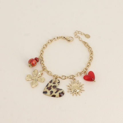 Bracelet Cléa - perles en céramique, coeurs en résine, soleil et fleur
