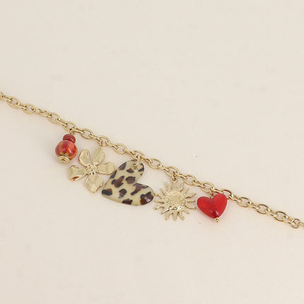 Bracelet Cléa - perles en céramique, coeurs en résine, soleil et fleur