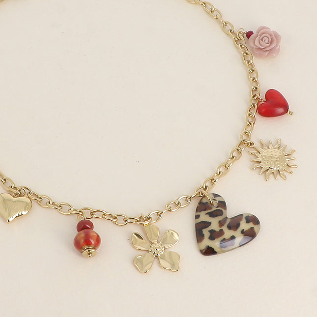 Cléa Necklace - ceramic beads, leopard hearts, textured, resin, sun and flower