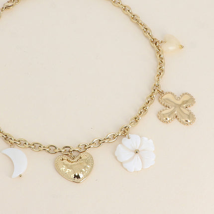 Collier - trèfle, coeurs, lune et fleur nacrées, coeur en résine