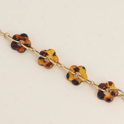 Bracelet - fleurs en résine et maillons ovales