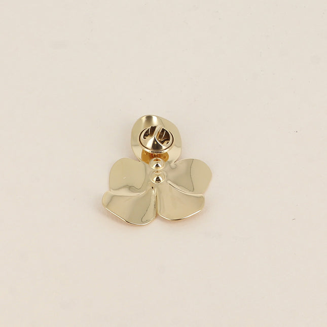 Pin's - motif floral et perles de résine blanche