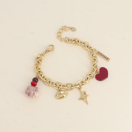 Bracelet - pendentifs (bouche, étoiles, rose et coeur en résine, perles, plaquette AMOUR)