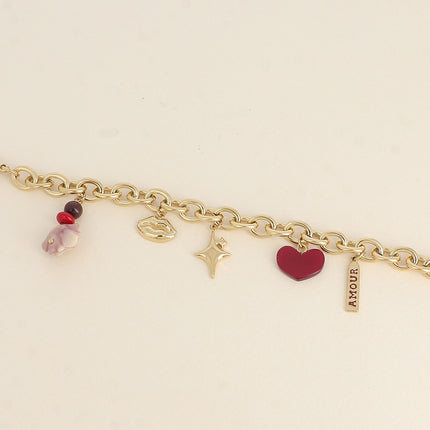Bracelet - pendentifs (bouche, étoiles, rose et coeur en résine, perles, plaquette AMOUR)